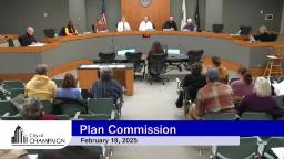 Video Thumbnail - Wide shot of the Plan Commissioners at the Dias. With Planning Director, Bruce Knight sitting to the side. Zoning Manager, Kat Trotter sitting with her back to us facing the commissioners as she gives her presentation. 