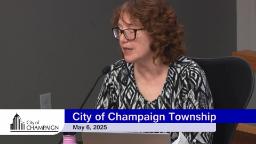Council Member Shannon Speaking into Microphone at Dias. 