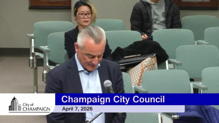 New City Historian Speaks at Audience Microphone