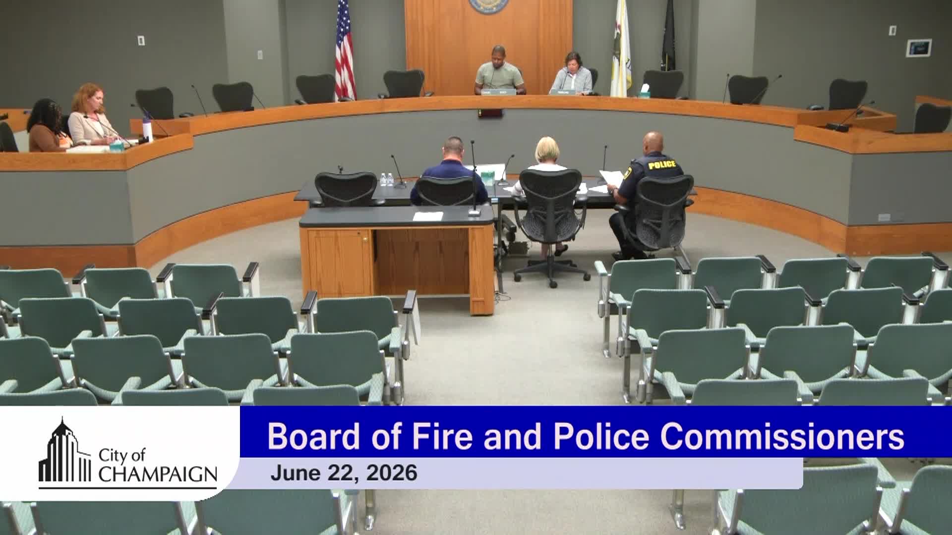 Wide Shot of Chambers with Board Members at the Dais and Staff in front of them at the presentation table. 